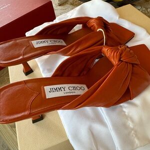 Brand new with tags , in original packaging. Jimmy Choo slides.